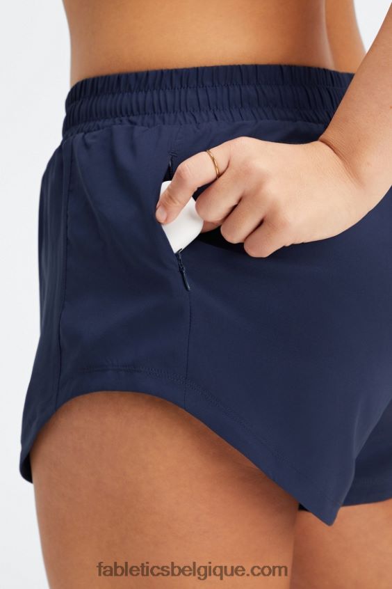 pleine vitesse mi-hauteur course courte femmes Fabletics 404P0T458 bleu marine/logo réfléchissant
