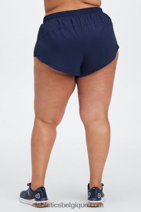 pleine vitesse mi-hauteur course courte femmes Fabletics 404P0T459 bleu marine/logo réfléchissant