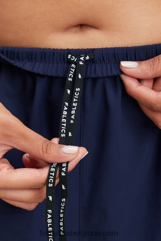 pleine vitesse mi-hauteur course courte femmes Fabletics 404P0T459 bleu marine/logo réfléchissant