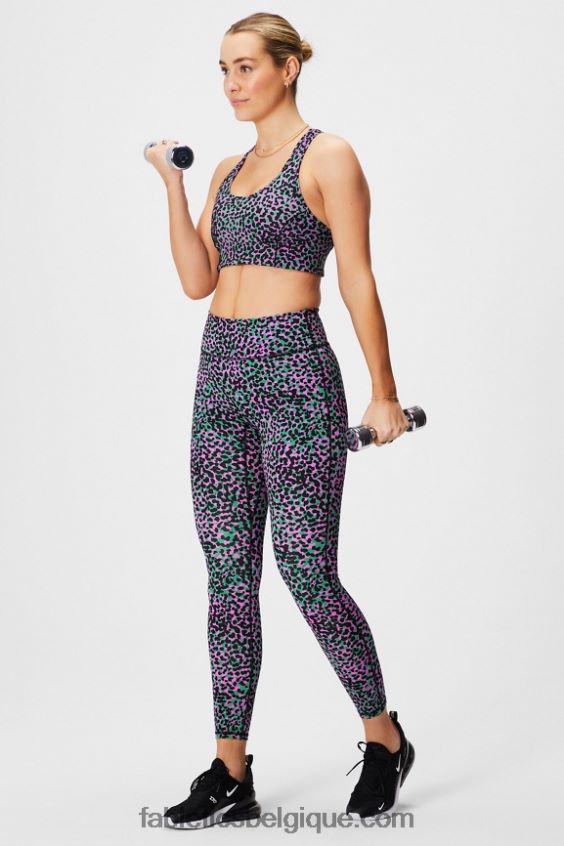 soutien-gorge de sport à impact moyen en déplacement 112 femmes Fabletics 404P0T1740 taches de safari vert herbe/noir
