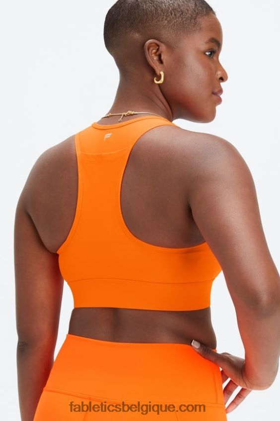 soutien-gorge de sport à impact moyen en déplacement 114 femmes Fabletics 404P0T1749 orange clignotant