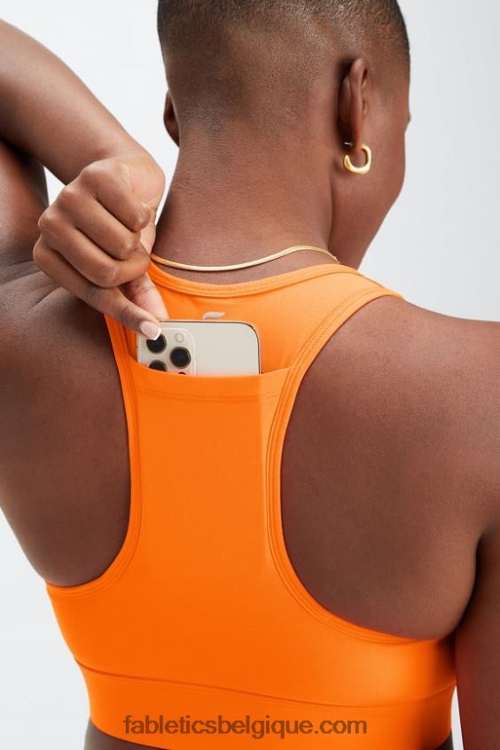 soutien-gorge de sport à impact moyen en déplacement 114 femmes Fabletics 404P0T1749 orange clignotant